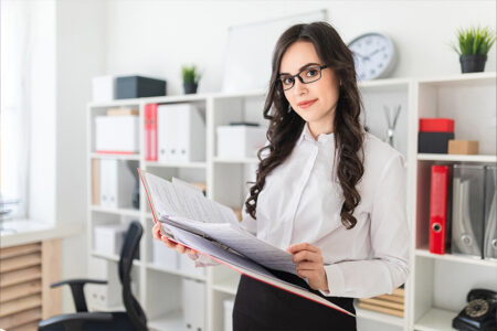 Businesswoman working with smart phone and laptop and digital t